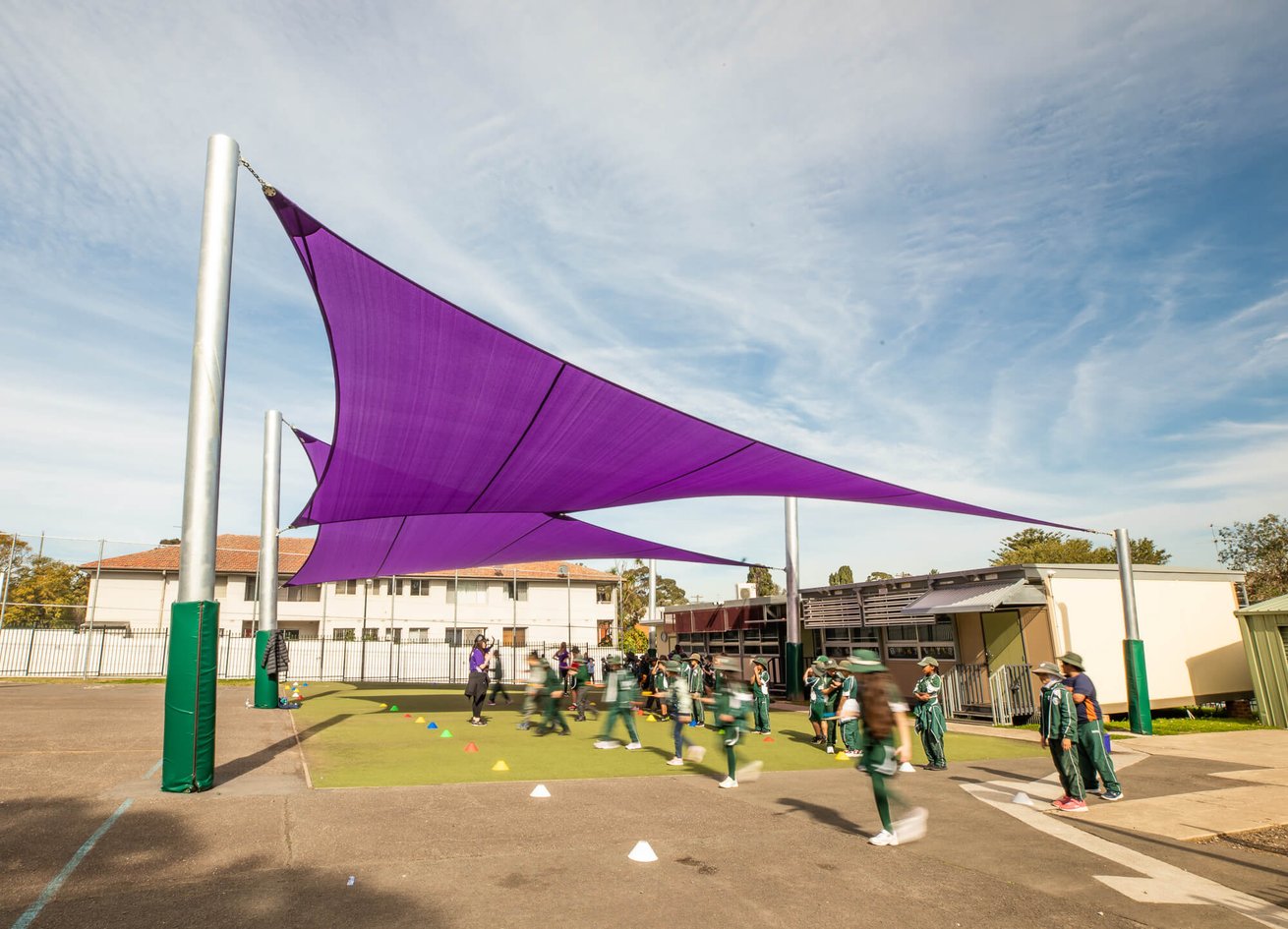 Wide view of large shade structures at a Sydney location.