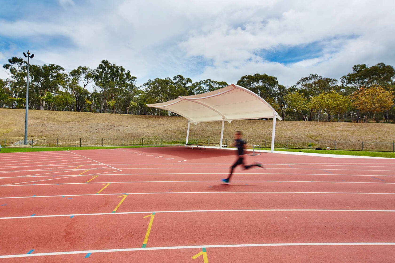 Greenline's shade structure at the AIS running track