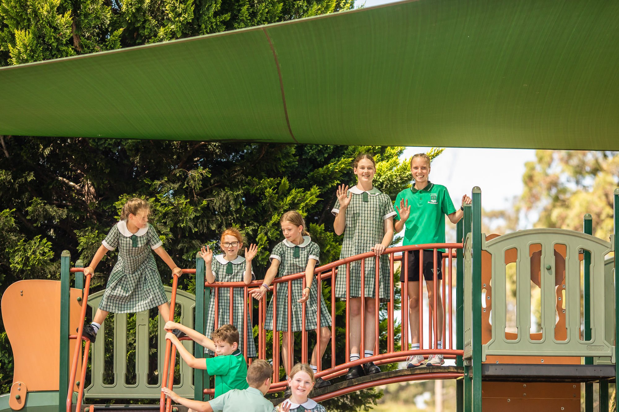 Commercial, waterproof shade sail installed in a school