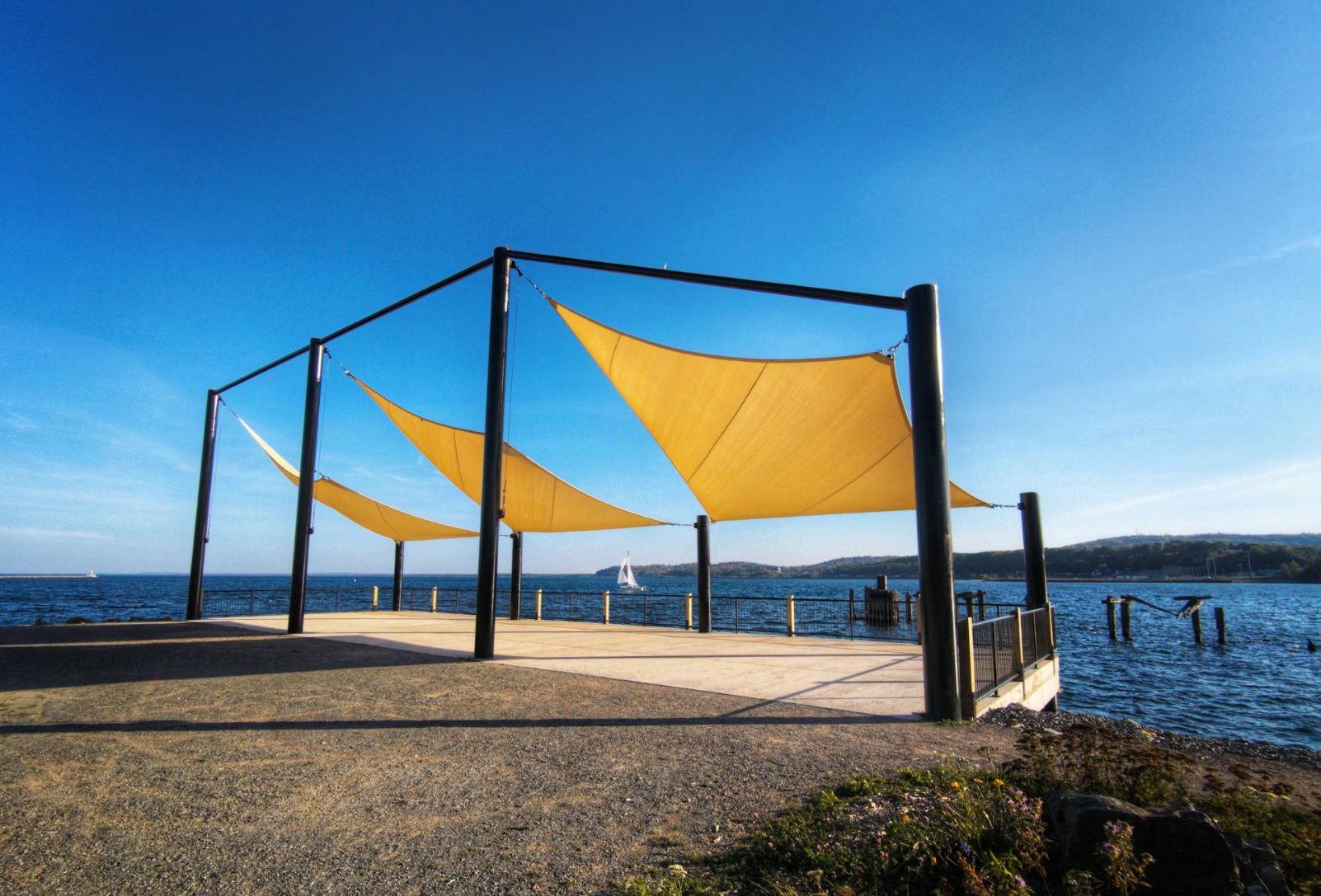Outdoor shade installation near a water body
