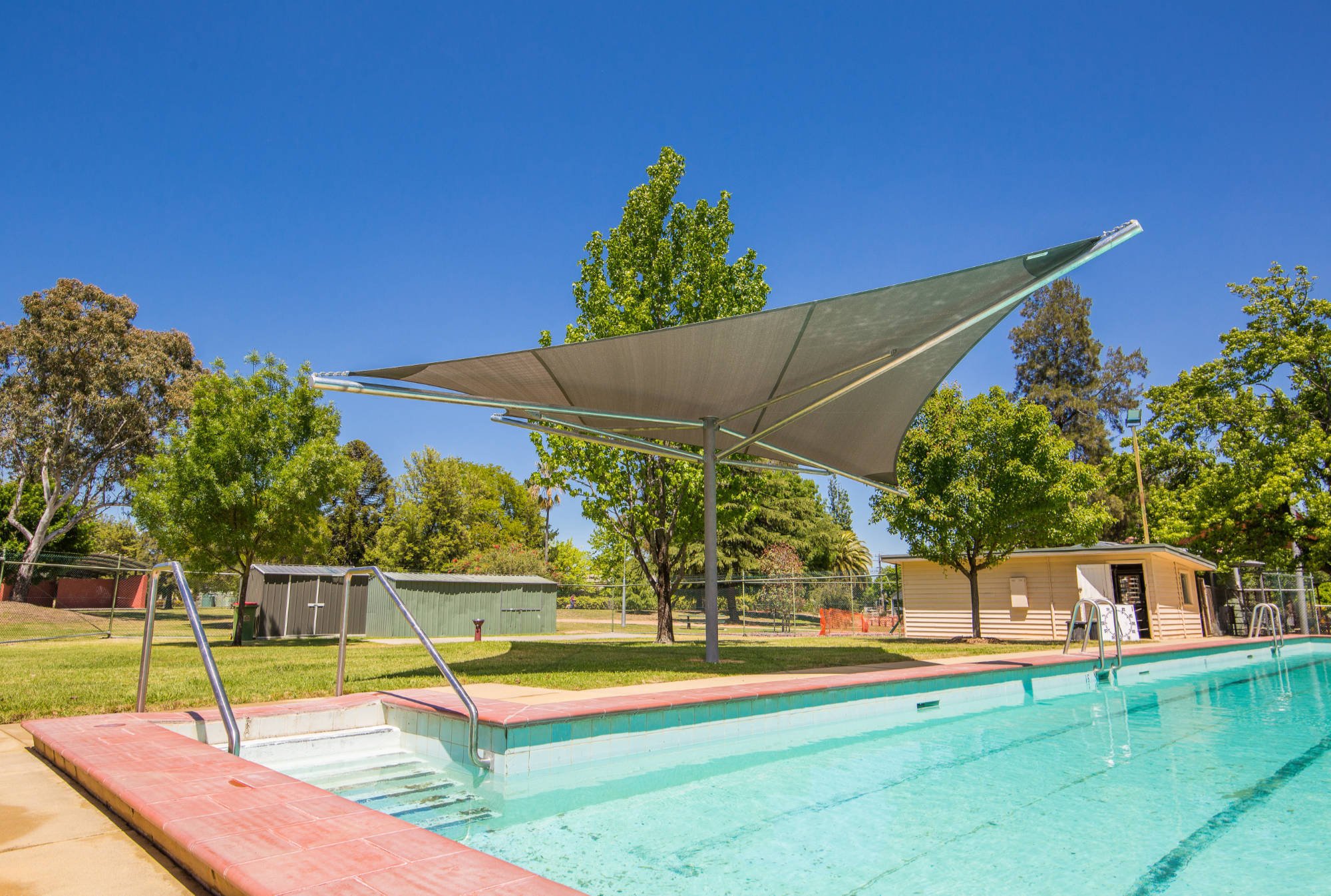 A poolside shade structure