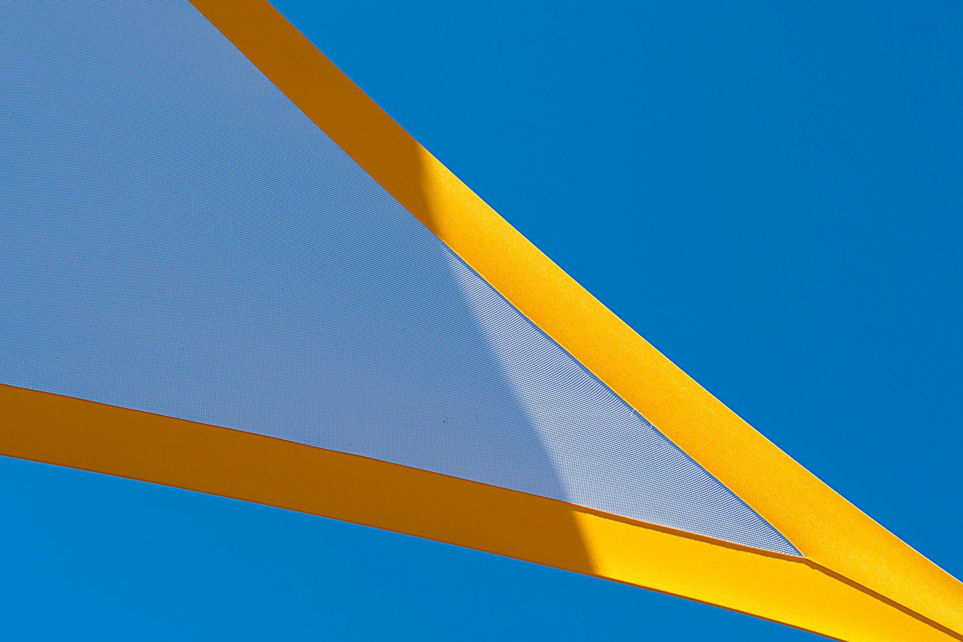 White and yellow shade sail fabric